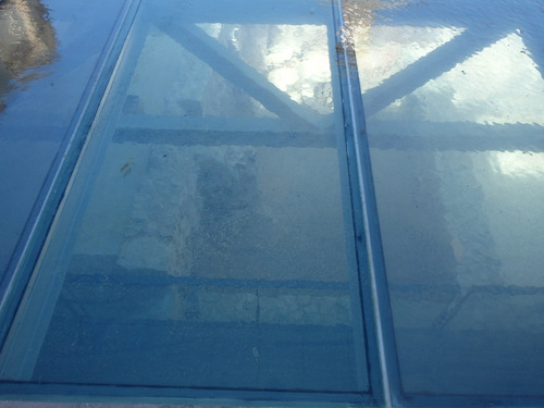 A see through roof covering the Roman Ruins.